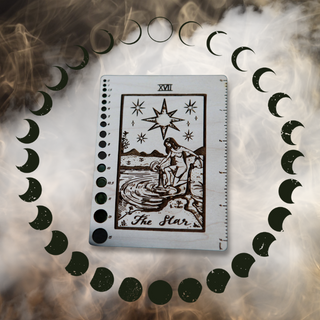 A tarot card called The Star is centered within a circular pattern of moon phases, surrounded by swirling smoke or mist. The card depicts a woman by water under a large star.