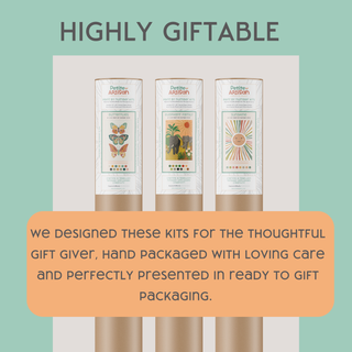 Three Smiley Sunshine Paint-by-Number Kits for Kids in tall, colorful cylindrical packages stand upright beneath the text "HIGHLY GIFTABLE." A box below highlights them as thoughtfully designed for screen-free creativity and easy gifting.