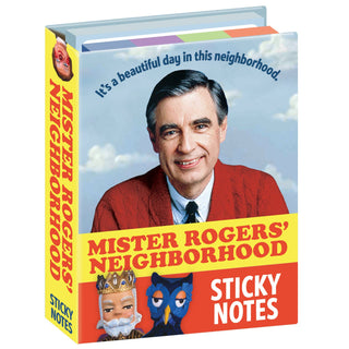 The Mister Rogers Sticky Notes come in a book-shaped box featuring a smiling man in a red sweater, puppets, clouds, and the phrase “It’s a beautiful day in this neighborhood”—perfect for message-friendly sticky notes.