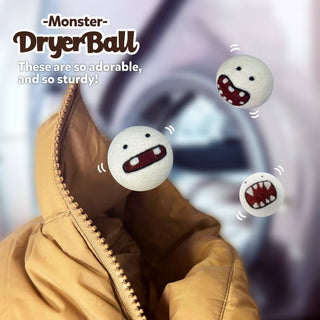 Three Wool Felted Monster Dryer Balls with cute monster faces float above a tan jacket near an open washing machine. Text reads: Wool Felted Monster Dryer Balls—adorable, eco-friendly, and sturdy laundry essentials!.
