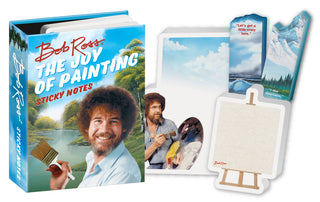 Bob Ross Sticky Notes come in a book-shaped case with designs featuring landscape scenes, Bob Ross with a brush, a blank easel, and snowy mountains—ideal for page markers or cheerful reminders.