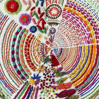 The Pie Embroidery Sampler showcases colorful embroidered patterns in vibrant shades arranged in semi-circles on white fabric, featuring various stitches, shapes, and textures.