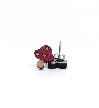Mushroom Earrings—single stud in red wood, featuring a white-spotted mushroom cap and light brown stem. Handmade in the USA from sustainable materials, hypoallergenic, and shown on a plain white background.