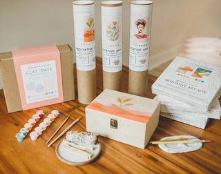 The Walk in Nature Meditative Art Paint by Number Kit, shown with art supplies on a wooden table, invites you to a calming creative ritual.