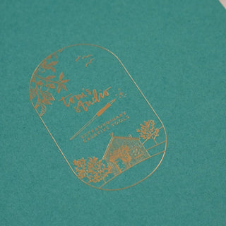 The gold-embossed logo on teal, with leaves, birds, a pen, and a house with trees, reads “Toni’s Studio” and “Extraordinary Creative Tools”—perfect for your Calligraphy Practice Pad or bleed proof paper.