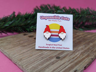 🍄 Gnome Earrings 🍄 displayed on a branded "Unpossible Cuts" card, resting on wood with greenery and a pink background—these handmade, hypoallergenic earrings are the perfect accessory for any occasion.