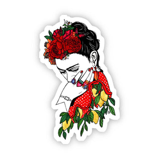 The Frida Kahlo | Roses and Lemons Sticker features an illustration of a person with flowers in their hair, eyes closed, and a hand adorned with rings gently covering part of their face. Leaves and lemons accent the red polka-dot scarf around their neck. Inspired by Frida Kahlo, this vinyl sticker is a beautiful symbol of mental health awareness and artistic self-expression.