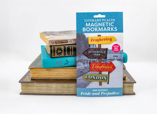 Pack of Pride and Prejudice magnetic bookmarks with book-themed designs on a stack of books.