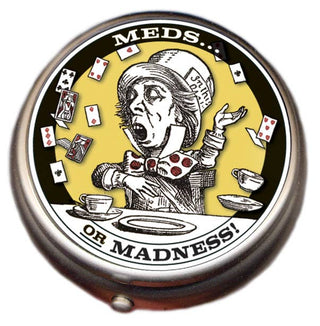 Pill box with a design of the Mad Hatter from 'Alice in Wonderland' and text 'Meds or Madness'.
