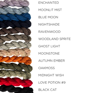 A vertical column of twelve multicolored skeins of yarn for the Tatters the Cat Poppet | Knitting Kit, each labeled with its corresponding color name.