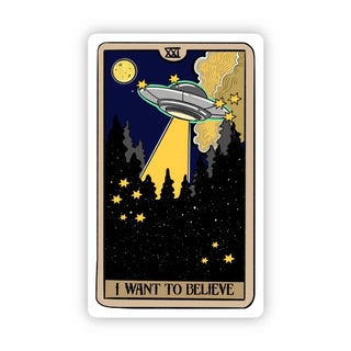 The I Want To Believe UFO Tarot Card Sticker shows a flying saucer beaming yellow lights over a moonlit forest, with “XXI” at the top and “I WANT TO BELIEVE” below—an ideal accessory for any UFO or tarot card enthusiast.