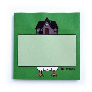 The Baba Yaga Sticky Notes are green, inspired by witch stationery, with a house and cat silhouette on top, cartoon chicken legs below, and a blank center for notes—perfect for adding whimsy to every list!.