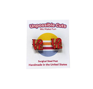 ❤️ LOVE Earrings ❤️ displayed on a card reading "Unpossible Cuts, We Make Fun." These handmade, hypoallergenic earrings feature surgical steel posts, a retro striped background, and are crafted with care in the United States.