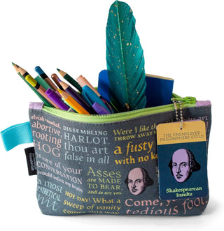The Shakespearean Insults Zipper Pouch features colorful Bard-inspired insults and holds pencils, pens, a green feather quill, and a small blue notebook—making it an ideal literary gift from the Unemployed Philosophers Guild.