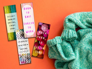 Printable Bookmarks for Knitters - Brights: Four vibrant bookmarks with yarn patterns and fun knitting quotes are displayed on an orange surface beside a green knitted sweater. Perfect printable gifts for knitting lovers.
